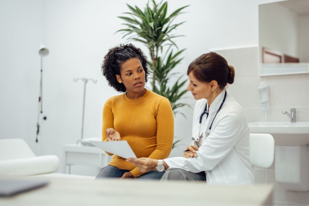 woman with PCOS at the doctor